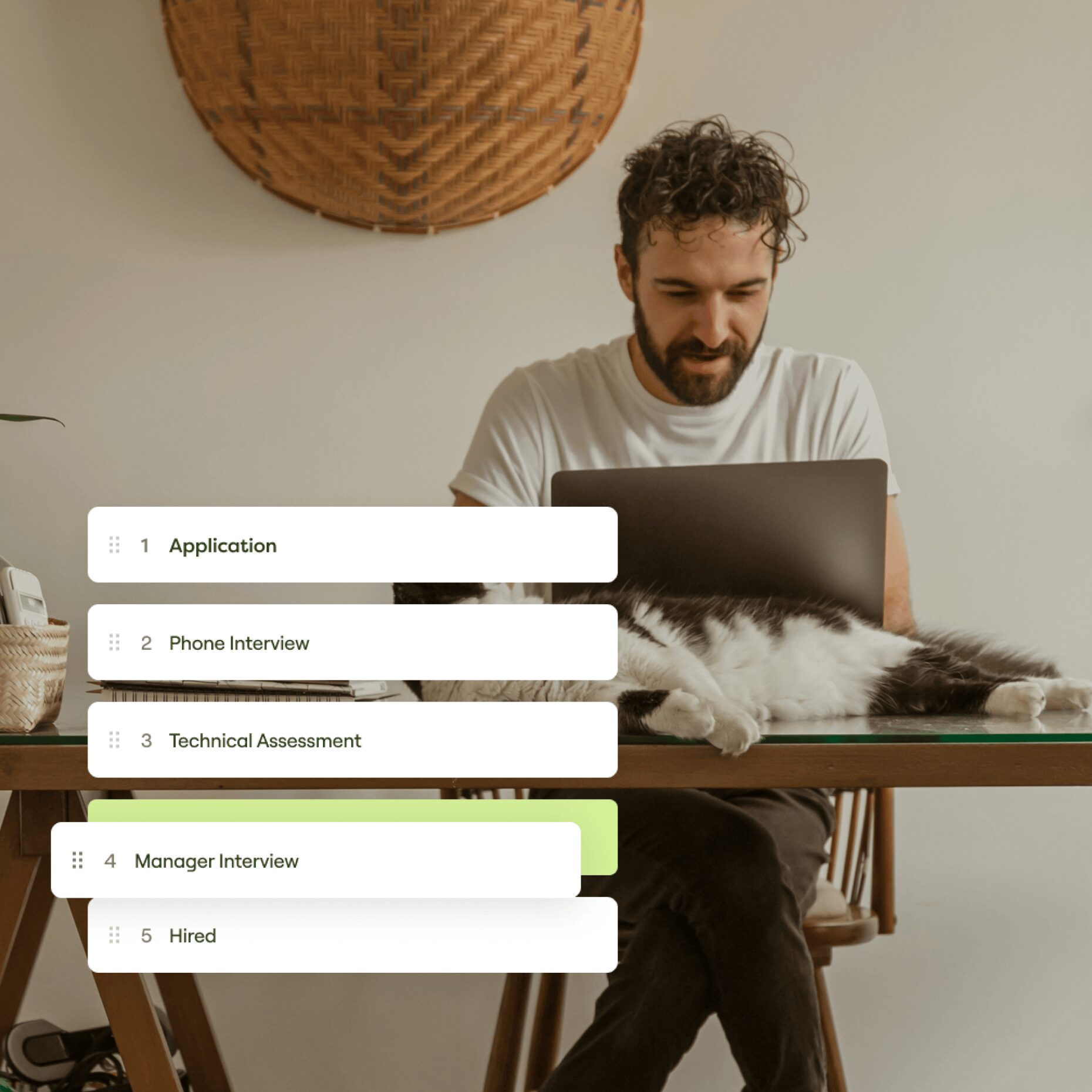 A man sat at his laptop with a visualisation of a customisable workflow overlaid