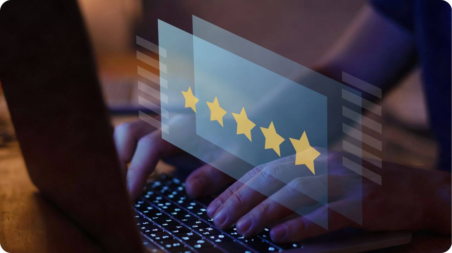 A graphic showing someone's hands using a keyboard with five yellow stars overlaid implying five star review.